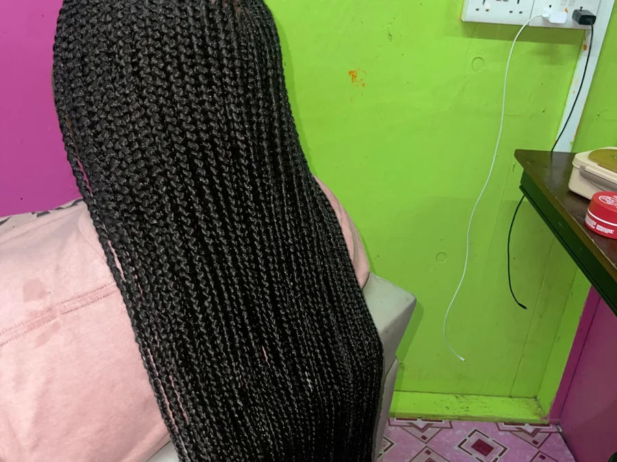 Feeding cornrows waist length