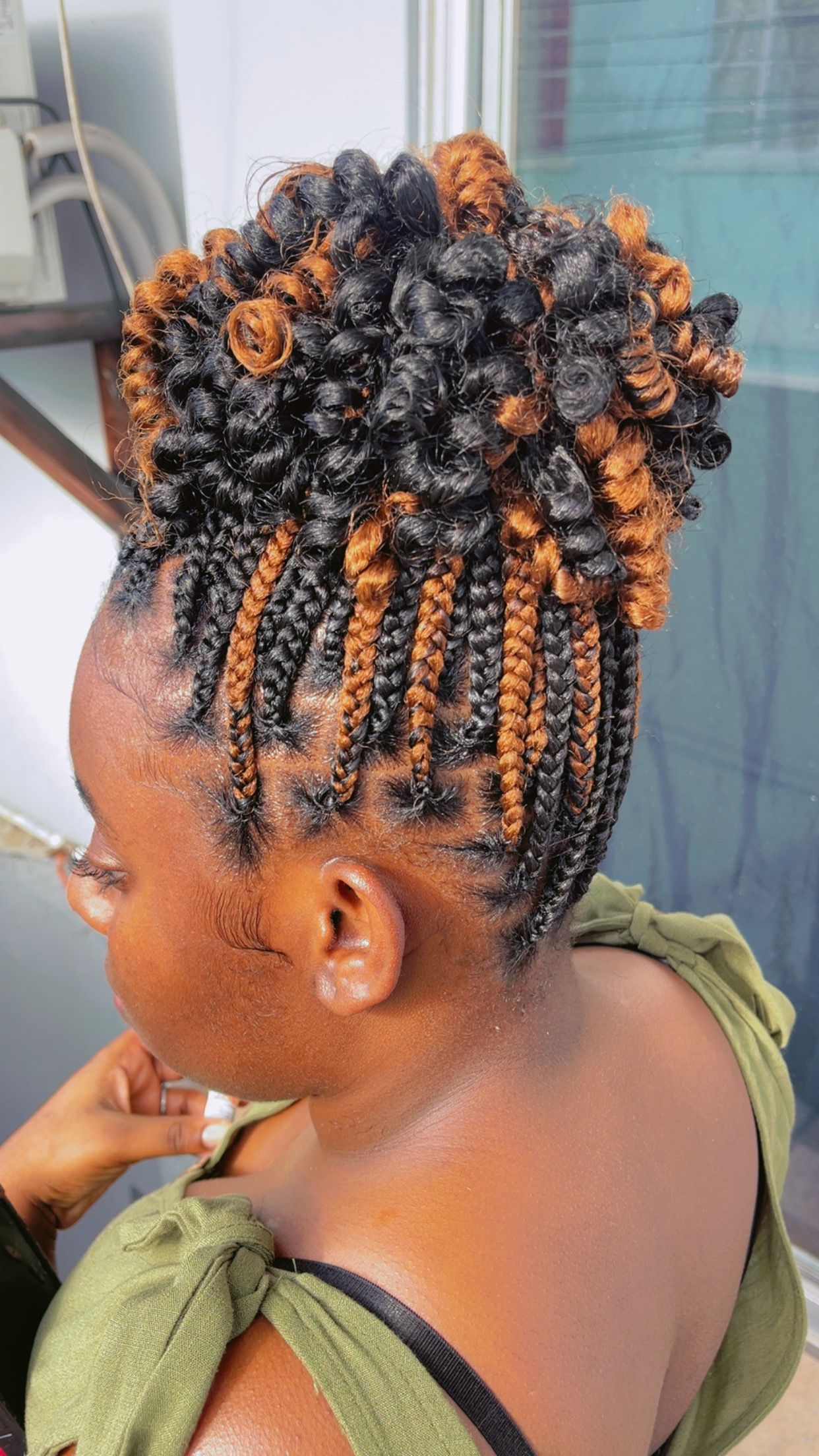 Short small knotless braids with curled ends