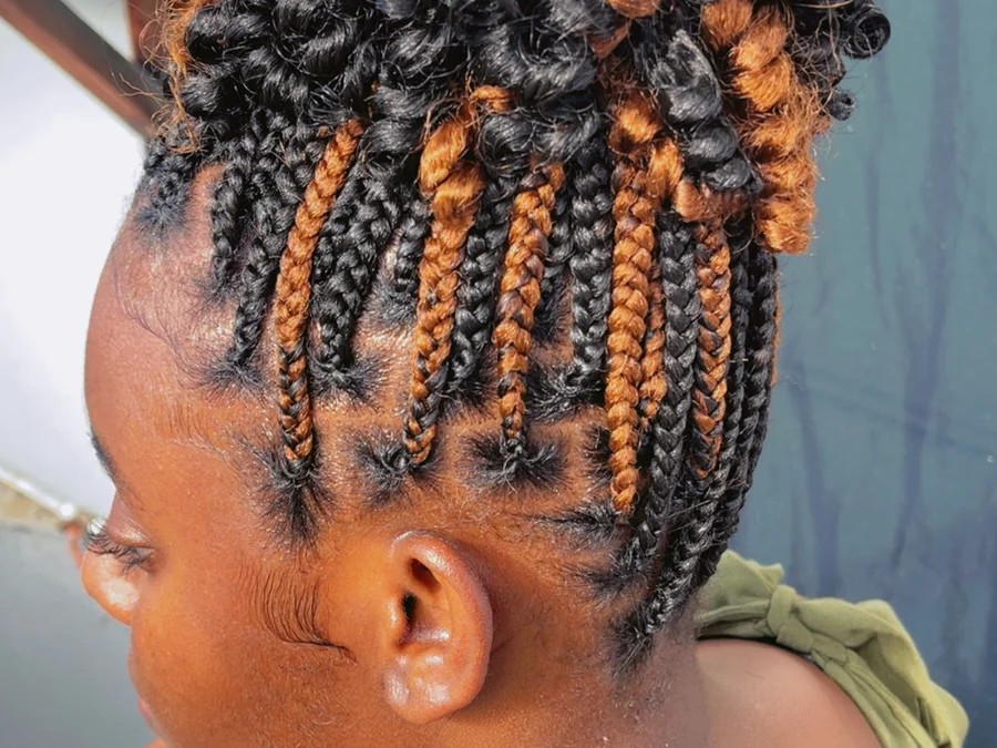 Short small knotless braids with curled ends